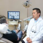 Dr. Raymond Liu with patient