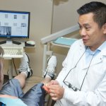 Dr. Raymond Liu with patient