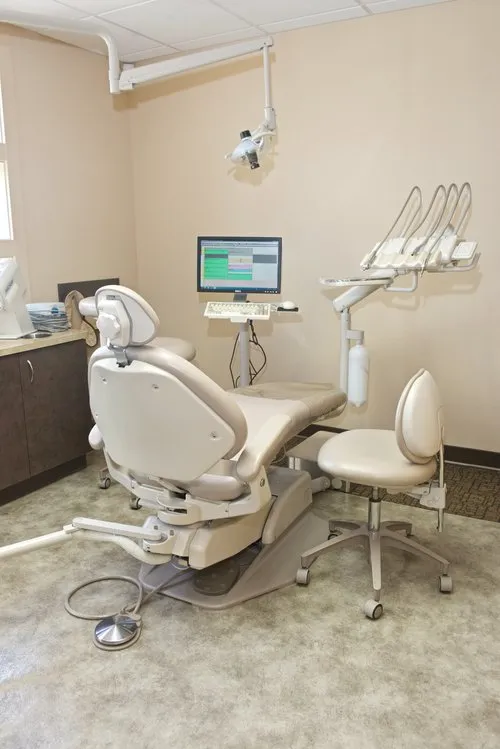 Left view of procedure room Office Photo with chair and dental technology