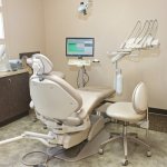 Left view of procedure room Office Photo with chair and dental technology